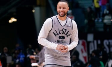 Stephen Curry smiles during a practice session in Cleveland