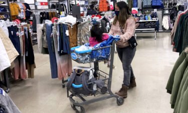 Consumers shop at a retail store in Vernon Hills