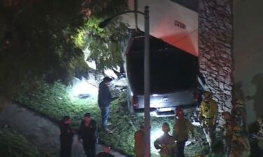 A man and his 3-year-old daughter were killed after a speeding pickup truck crashed into their Long Beach apartment.