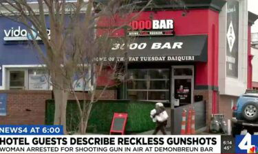 A 28-year-old woman shot a pistol into the air after police said she left the 3000 Bar early Saturday morning.
