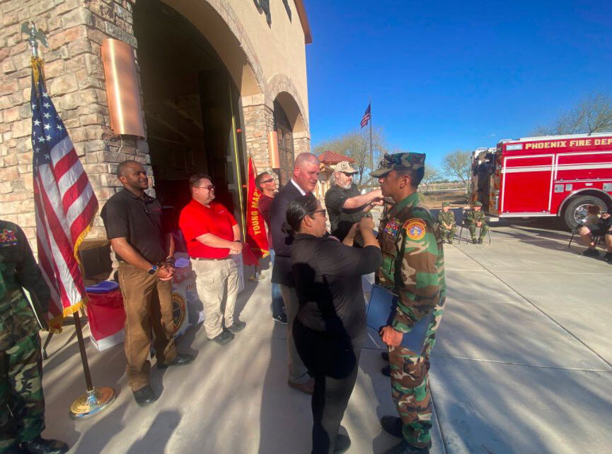 Monday honored by Marines for saving flag