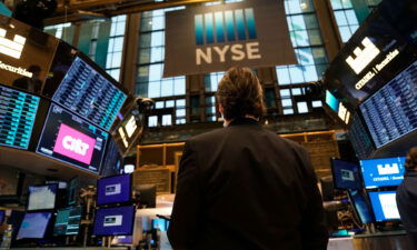 Traders work on the floor of the New York Stock Exchange at the opening bell January 25. Wall Street firms have figured out a way to beat inflation for their employees by hiking annual bonuses to record amounts.