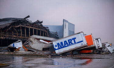 Burned semi-trailers are seen after a fire at a Walmart distribution center in Plainfield