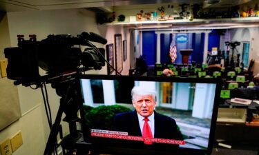 U.S. President Donald Trump is shown speaking on a monitor in the White House briefing room about the violence during the ratification of the 2020 election on January 6