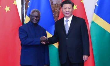 Chinese President Xi Jinping meets with Solomon Islands' Prime Minister Manasseh Sogavare at the Diaoyutai State Guesthouse in Beijing