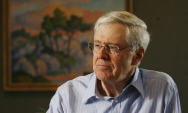 Koch Industries announced it will continue to operate in Russia. Seen here is Charles Koch