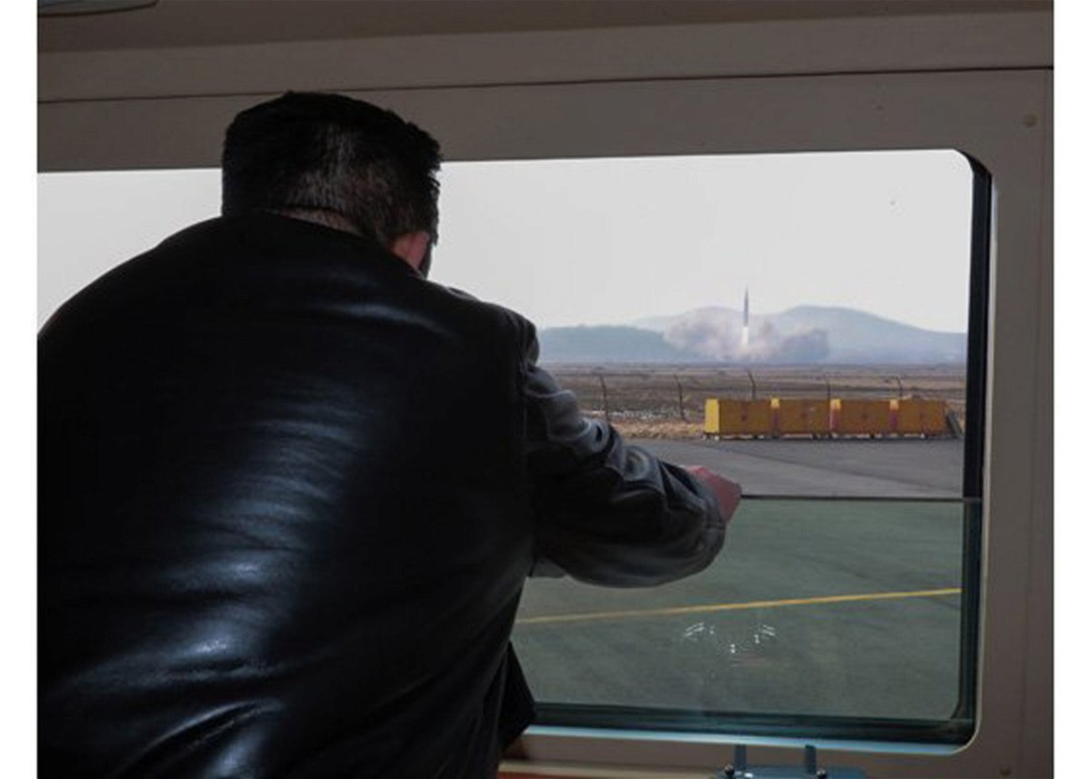<i>Rodong Sinmun</i><br/>Kim Jong Un is shown watching a missile launch
