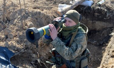 A serviceman of Ukrainian military forces holds a FGM-148 Javelin