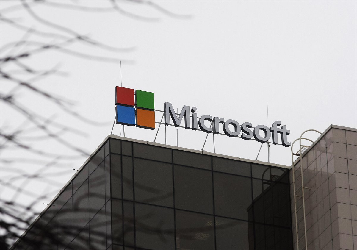 <i>Vladimir Sindeyeve/NurPhoto/Shutterstock</i><br/>Microsoft Corporation logo is seen on a top of a building in Kyiv