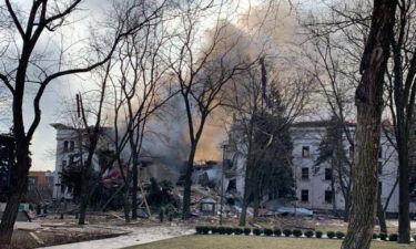 Smoke rises after the bombing of the theater