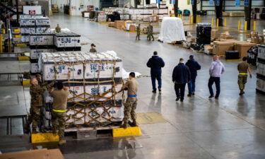 Airmen from the 436th and 72nd Aerial Port Squadrons palletize equipment bound for Ukraine during a foreign military sales mission at Dover Air Force Base