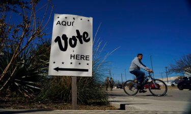 Voters leave an early voting poll site February 14 in San Antonio. Texas kicks off the 2022 midterm elections March 1 with the nation's first primaries.