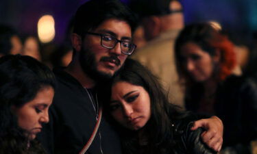 Fans react after learning of the death of Foo Fighters' drummer Taylor Hawkins at the Festival Estéreo Picnic in Bogotá