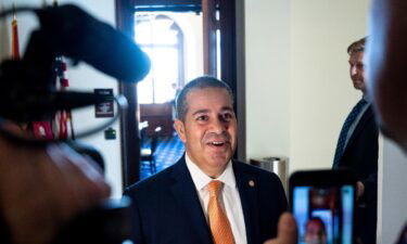 Sen. Ben Ray Luján speaks to reporters outside a Senate committee meeting on his first day back in the Senate on Thursday. Luján returned to the Senate after suffering a stroke in January.
