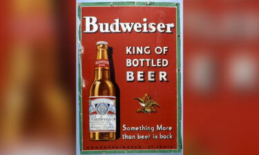 A "King of Bottled Beer" cardboard sign from the 1930s.