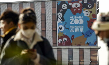 Pictured is an advertisement for Alibaba Zoo on the facade of a shopping mall in Hangzhou