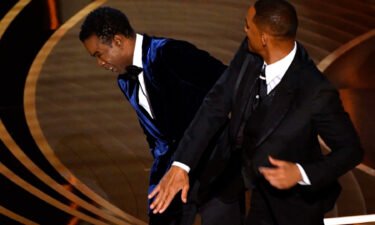 Chris Rock and Will Smith at Sunday's Oscars. The Academy says it has begun disciplinary action against Smith over the slap.