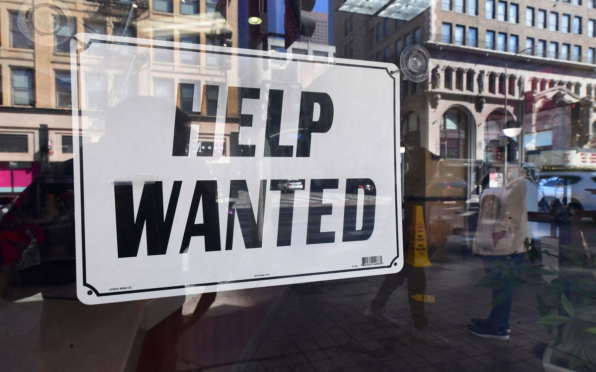 <i>Frederick J. Brown/AFP/Getty Images</i><br/>A 'help wanted' sign is posted in front of restaurant on February 4