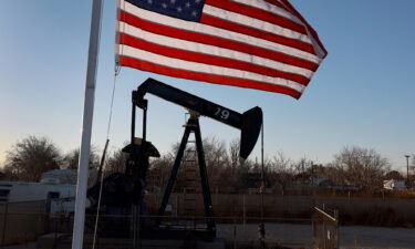 An oil pumpjack setup in a residential neighborhood pulls oil from the Permian Basin oil field on March 13 in Odessa