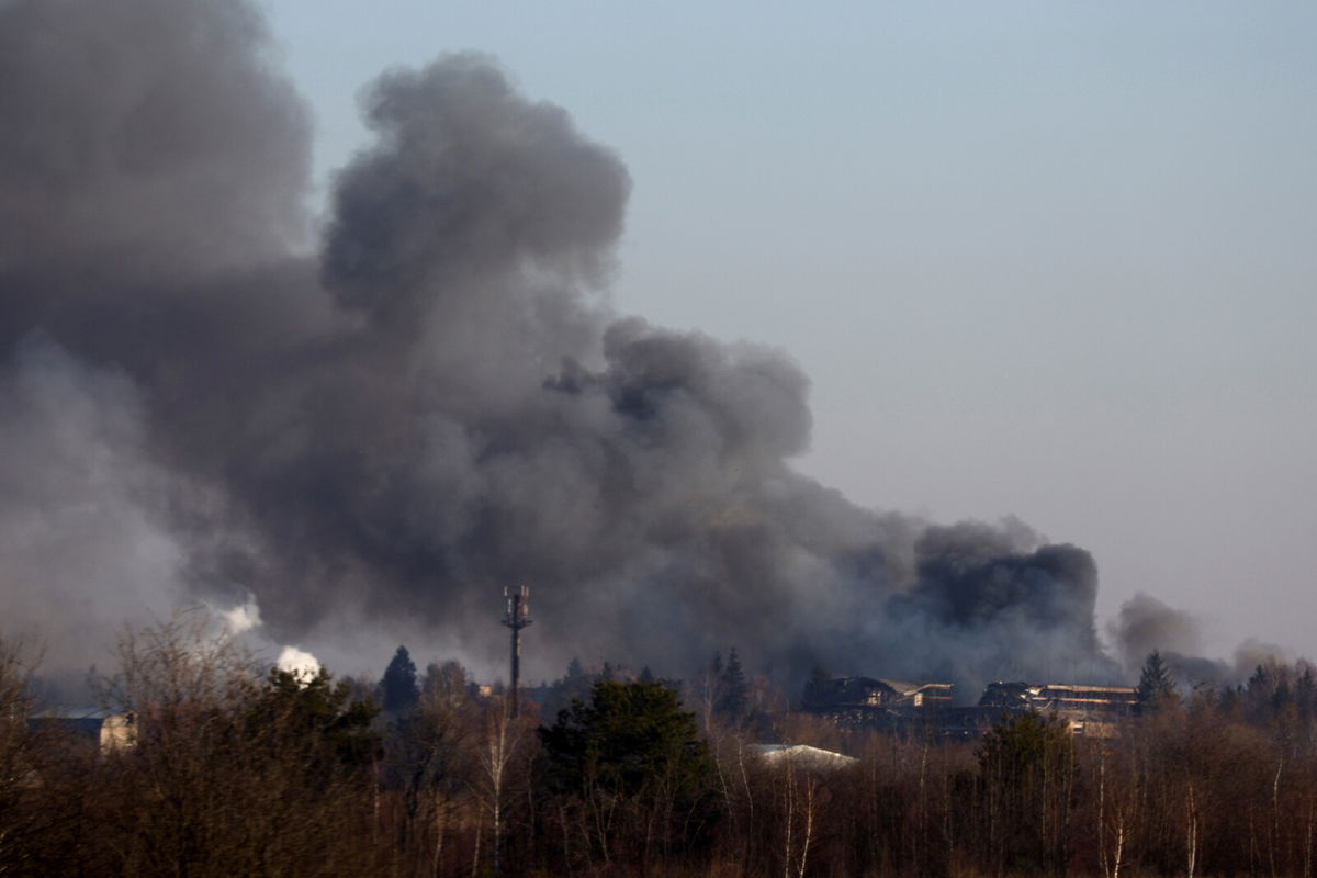 <i>Kai Pfaffenbach/Reuters</i><br/>Smoke rises from a factory building near Lviv airport