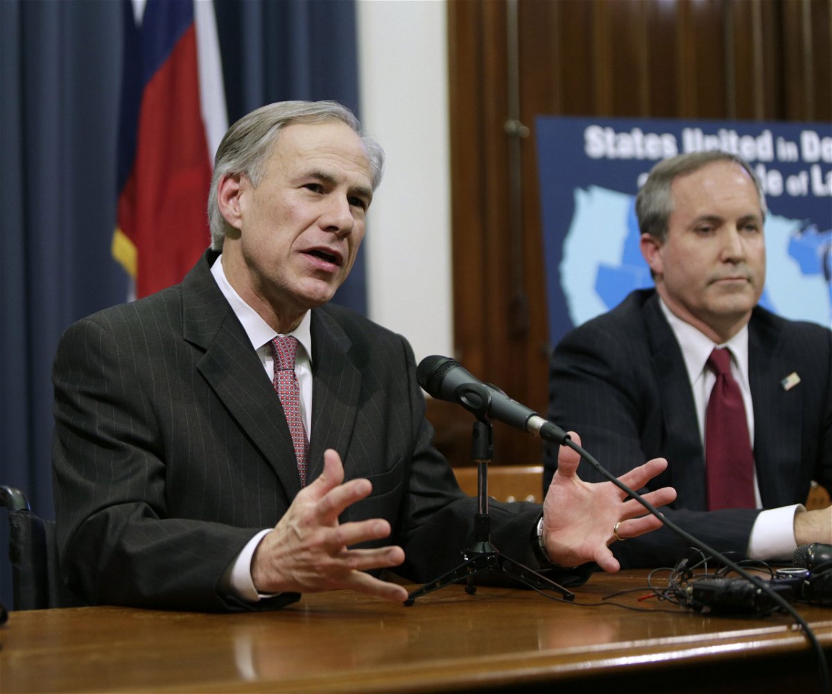 <i>Erich Schlegel/Getty Images/File</i><br/>Texas Gov. Greg Abbott and state Attorney General Ken Paxton
