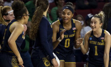 Notre Dame celebrates on the sideline against Oklahoma in the NCAA women's college basketball tournament on March 21.