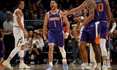 Devin Booker lets out a primal roar after he grabbed an offensive rebound for a putback