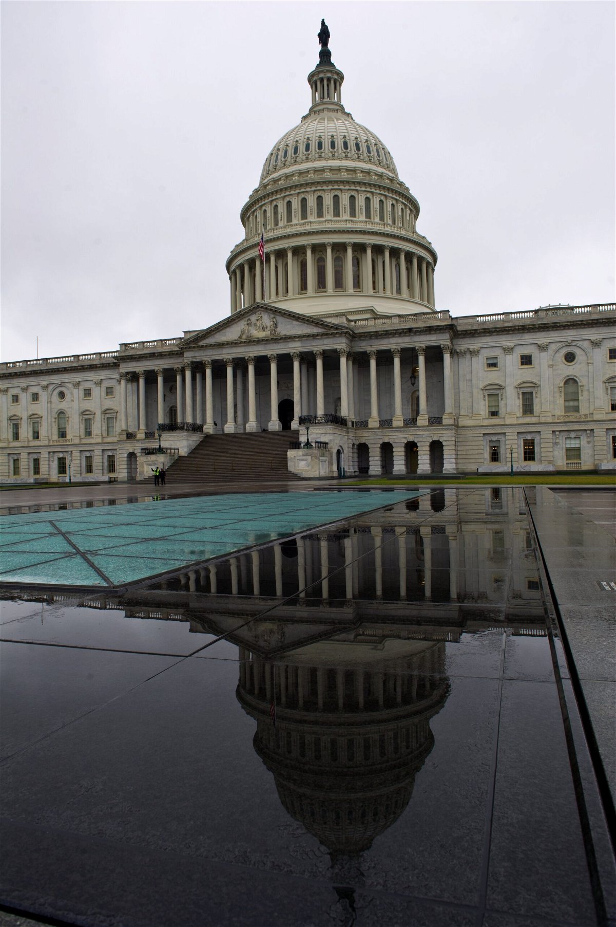<i>KAREN BLEIER/AFP/Getty Images</i><br/>The US Capitol dome and its reflection are seen on Capitol Hill in Washington