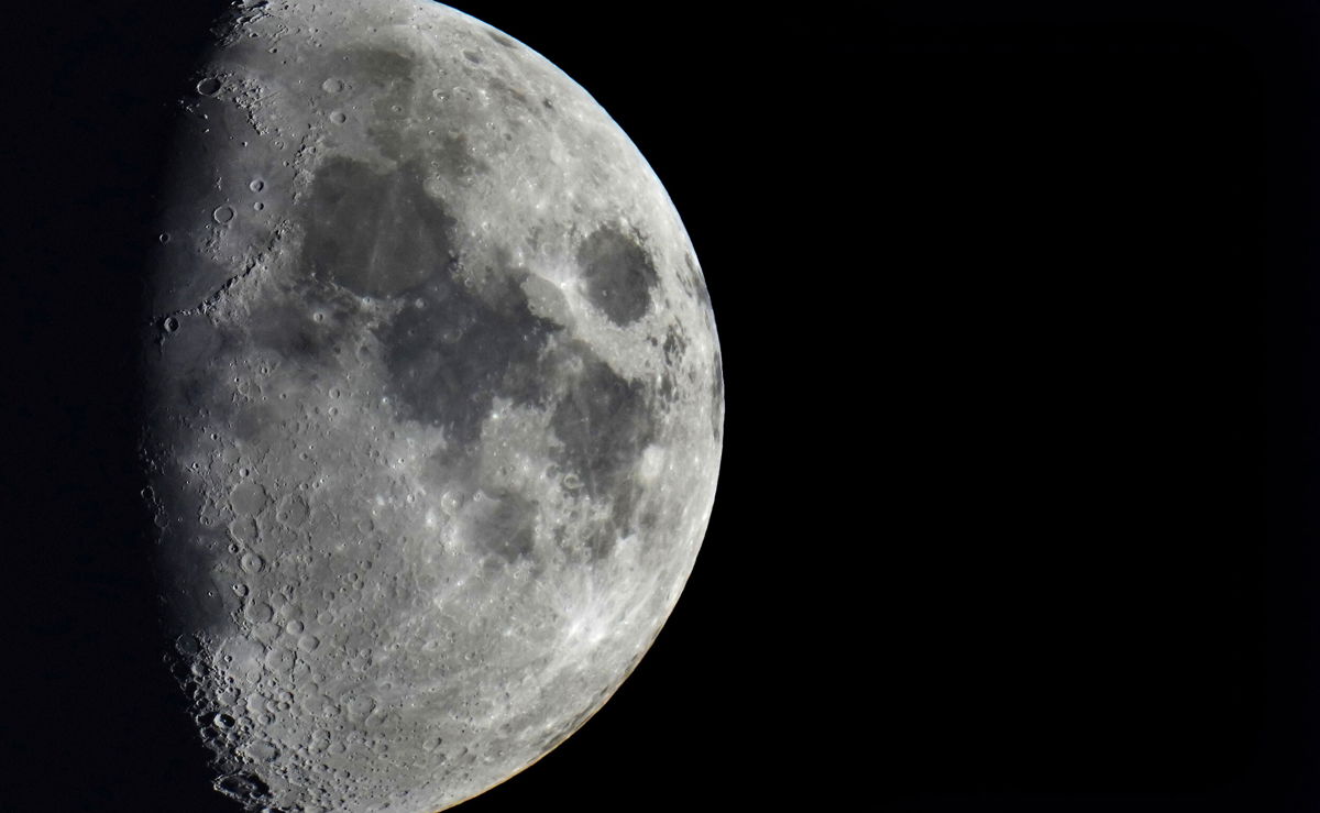 <i>Michael Sohn/AP</i><br/>Impact craters cover the surface of the moon as it's seen over Berlin on January 11.