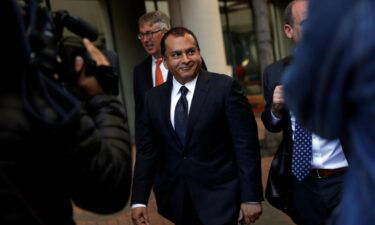 Former Theranos President and COO Ramesh "Sunny" Balwani smiles after a hearing at a federal court in 2019. More than two months after Theranos founder and former CEO Elizabeth Holmes was found guilty on four of 11 charges in her criminal fraud case