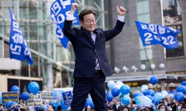 The ruling Democratic Party's presidential candidate Lee Jae-myung greets supporters on March 03.