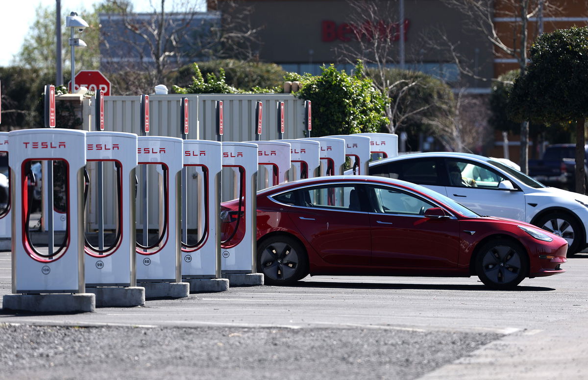 <i>Justin Sullivan/Getty Images</i><br/>A Tesla car recharges its battery at the Petaluma Supercharger on March 9 in Petaluma