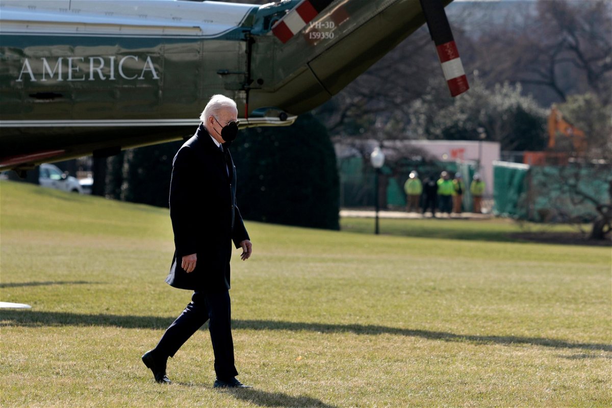 <i>Anna Moneymaker/Getty Images</i><br/>President Joe Biden walks on the South Lawn of the White House after returning on Marine One from Delaware on February 28