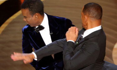 A Reuters photojournalist captured the moment Will Smith (R) hit Chris Rock during the 94th Academy Awards in Los Angeles
