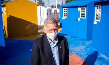 US District Judge David Carter tours the Chandler Tiny Home Village in North Hollywood on February 11