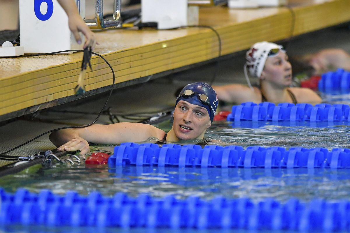 <i>Rich von Biberstein/Icon Sportswire/AP</i><br/>University of Pennsylvania swimmer Lia Thomas reacts after swimming the 100 Freestyle prelims at the NCAA Swimming and Diving Championships on March 19 in Atlanta.