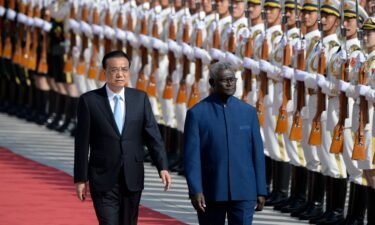 Solomon Islands Prime Minister Manasseh Sogavare and Chinese Premier Li Keqiang at the Great Hall of the People in Beijing on October 9