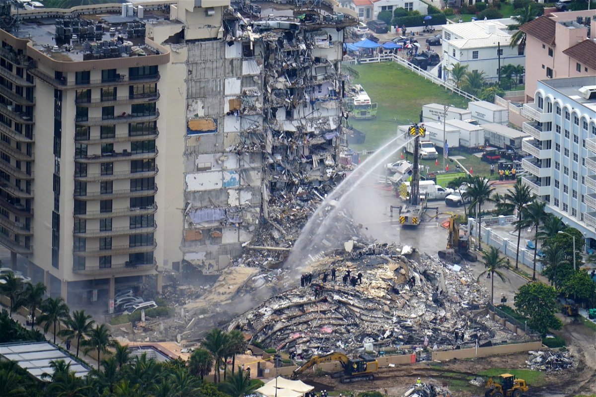 <i>Gerald Herbert/AP</i><br/>A Florida judge has approved a $83 million settlement for victims' families and owners in the Champlain Towers South collapse
