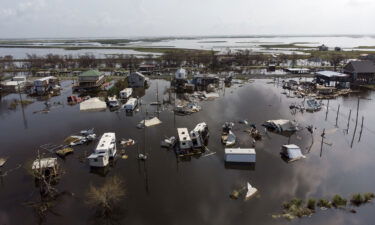 Damaged homes in floodwater after Hurricane Ida are shown in Louisiana