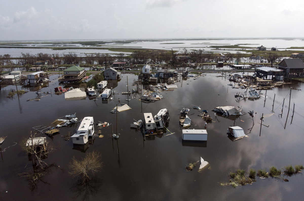 <i>Mark Felix/Bloomberg/Getty Images</i><br/>Damaged homes in floodwater after Hurricane Ida are shown in Louisiana