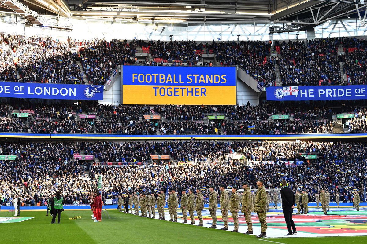 <i>Justin Tallis/AFP/Getty Images</i><br/>A 'Football Stands Together' message is displayed in Ukrainian colours ahead of the English League Cup final football match between Chelsea and Liverpool at Wembley Stadium