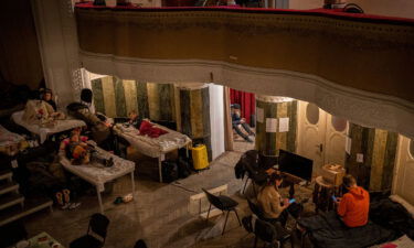 Displaced Ukrainians take shelter in an auditorium in Lviv on March 2.