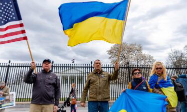 Members of United Help Ukraine and other activists hold a rally outside the White House on March 20 in Washington