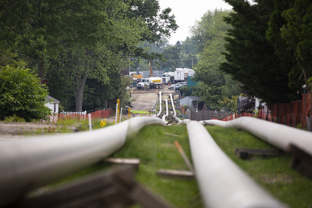 <i>Robert Nickelsberg/Getty Images</i><br/>Sections of steel pipe lie in a staging area in Exton