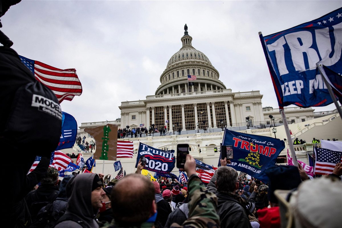 <i>Samuel Corum/Getty Images</i><br/>Pro-Trump supporters storm the US Capitol following a rally with President Donald Trump on January 6