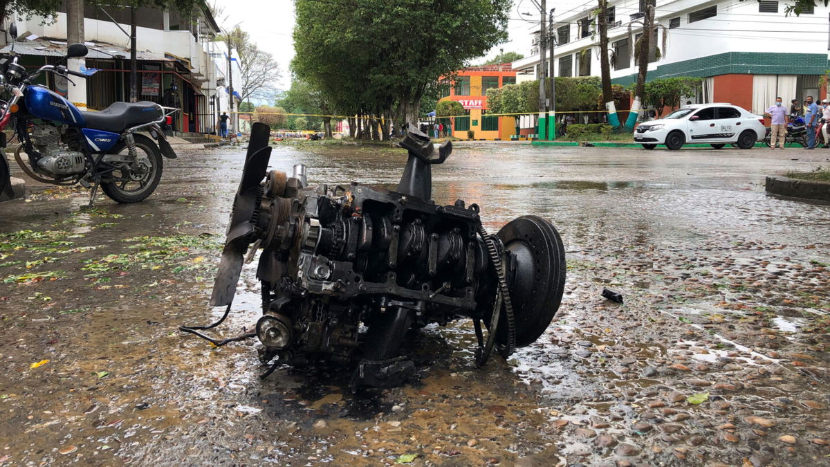 <i>Mike Caceres/AP</i><br/>Wreckage from a car bomb is seen in Saravena