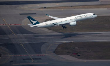 An aircraft operated by Cathay Pacific Airways Ltd. takes off from Hong Kong International Airport in Hong Kong