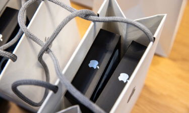 Apple iPhone 13 Pro smartphones inside a shopping bag at an Apple store in New York