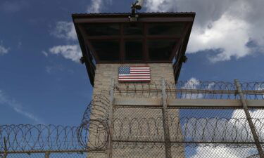 A guard tower stands at the entrance of the U.S. prison at Guantanamo Bay on October 23