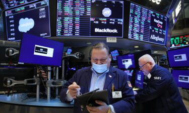 Traders work on the floor of the New York Stock Exchange (NYSE) on March 8 in New York City. The Dow was up slightly in morning trading as the Russian invasion of Ukraine continues to unsettle global markets.